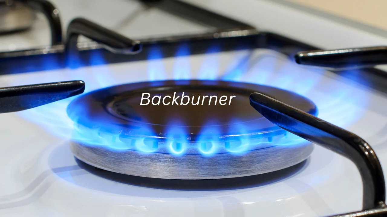 backburner meaning